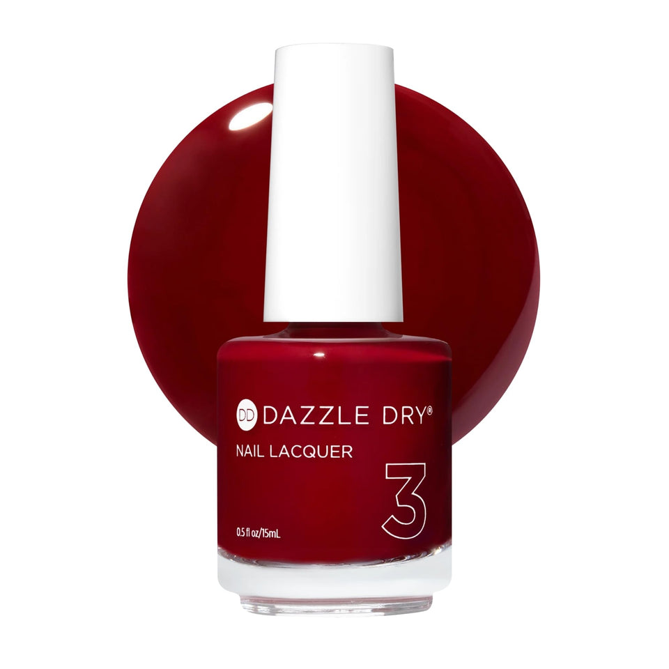 Dazzle Dry C.E.O. deep wine red lacquer application showing rich color and smooth coverage.