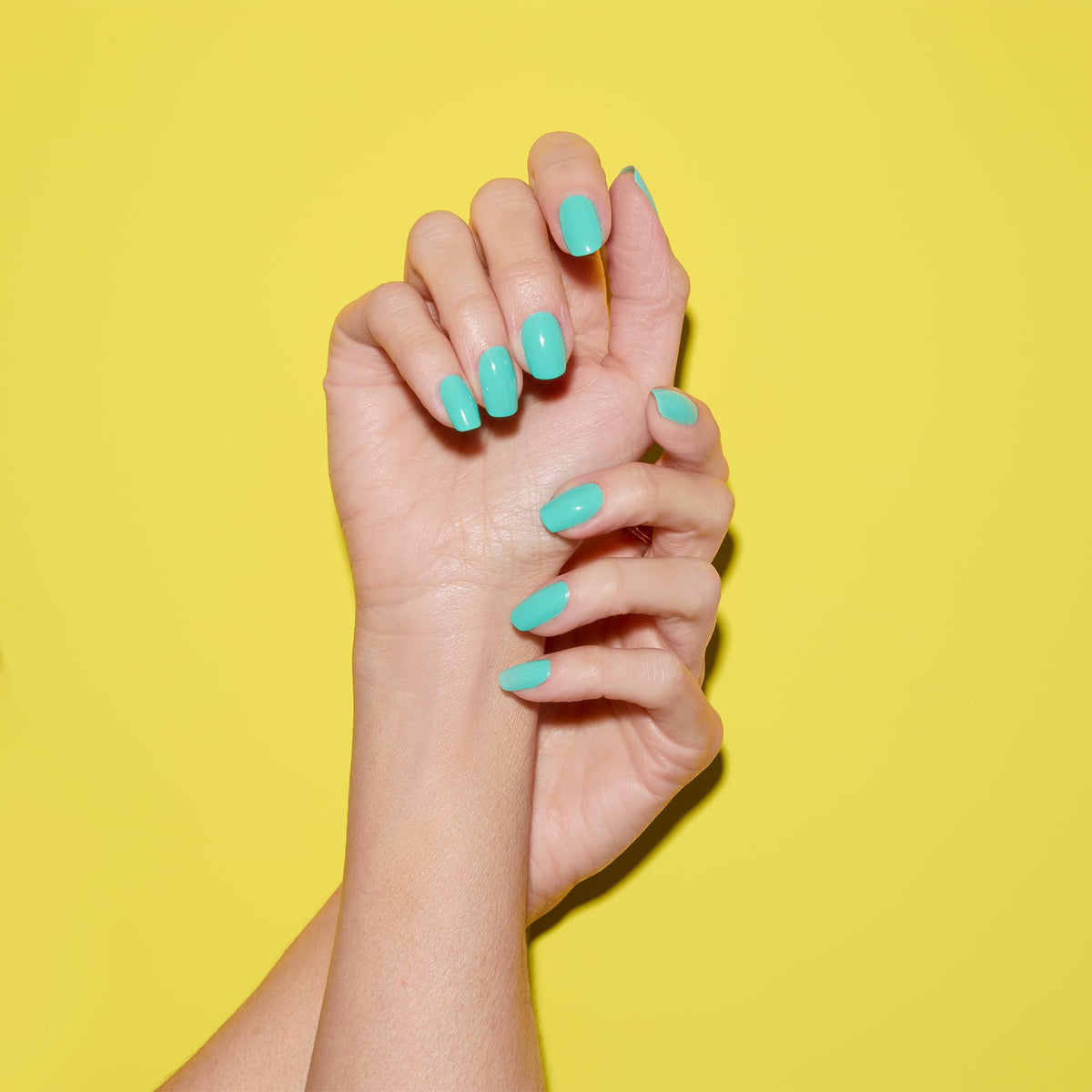 Dazzle Dry Coastal Cabana semi-sheer finish on nails for subtle color.