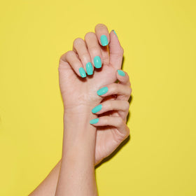 Dazzle Dry Coastal Cabana semi-sheer finish on nails for subtle color.
