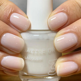 Dazzle Dry Fine China Lacquer delivers a sheer milky white finish.