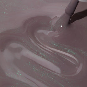 Dazzle Dry Lets Glow nail application swatch demonstrates quick-dry polish in action.