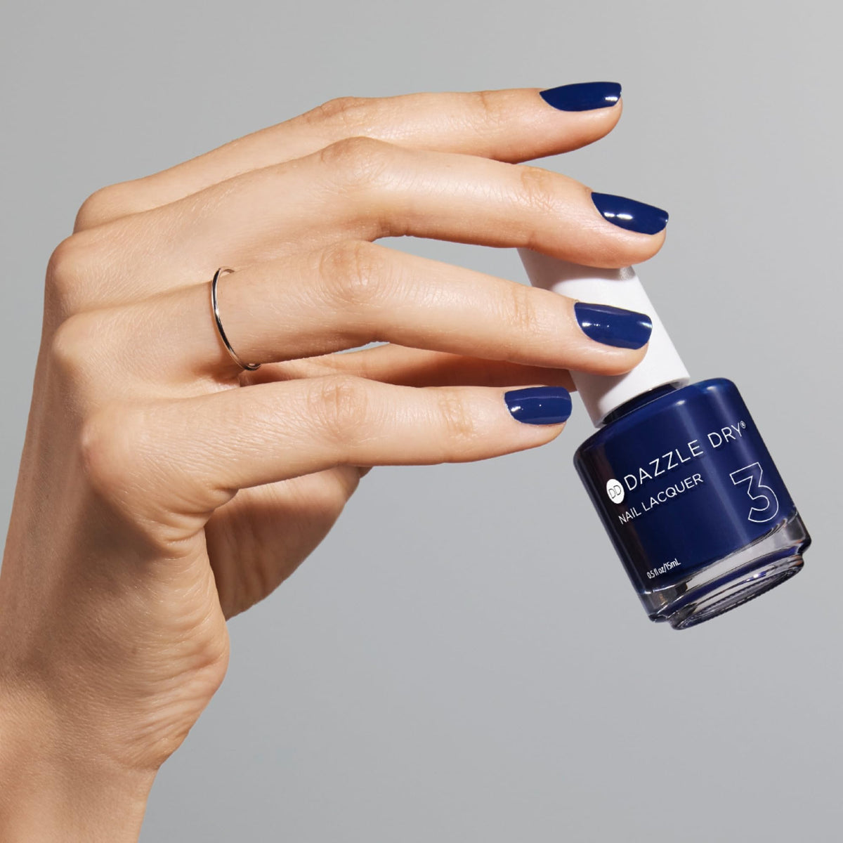 Dazzle Dry Midnight Sky full-application on nail with even coverage.