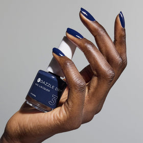 Dazzle Dry Midnight Sky top coat application seals for lasting shine.