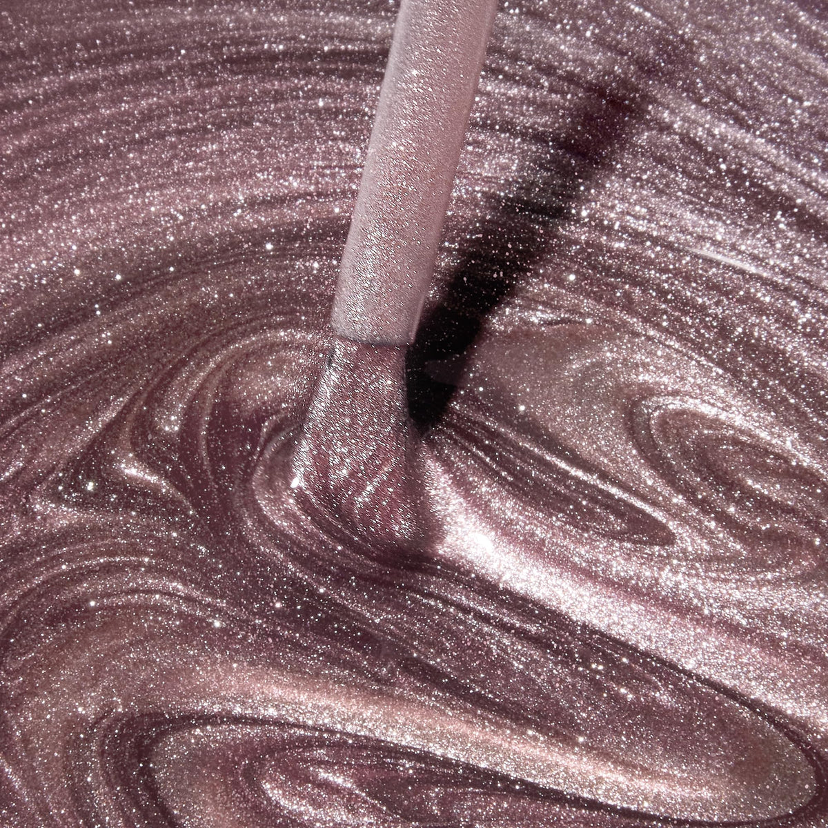Close-up manicure with Dazzle Dry Out N' About highlighting metallic shine.