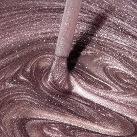 Close-up manicure with Dazzle Dry Out N' About highlighting metallic shine.