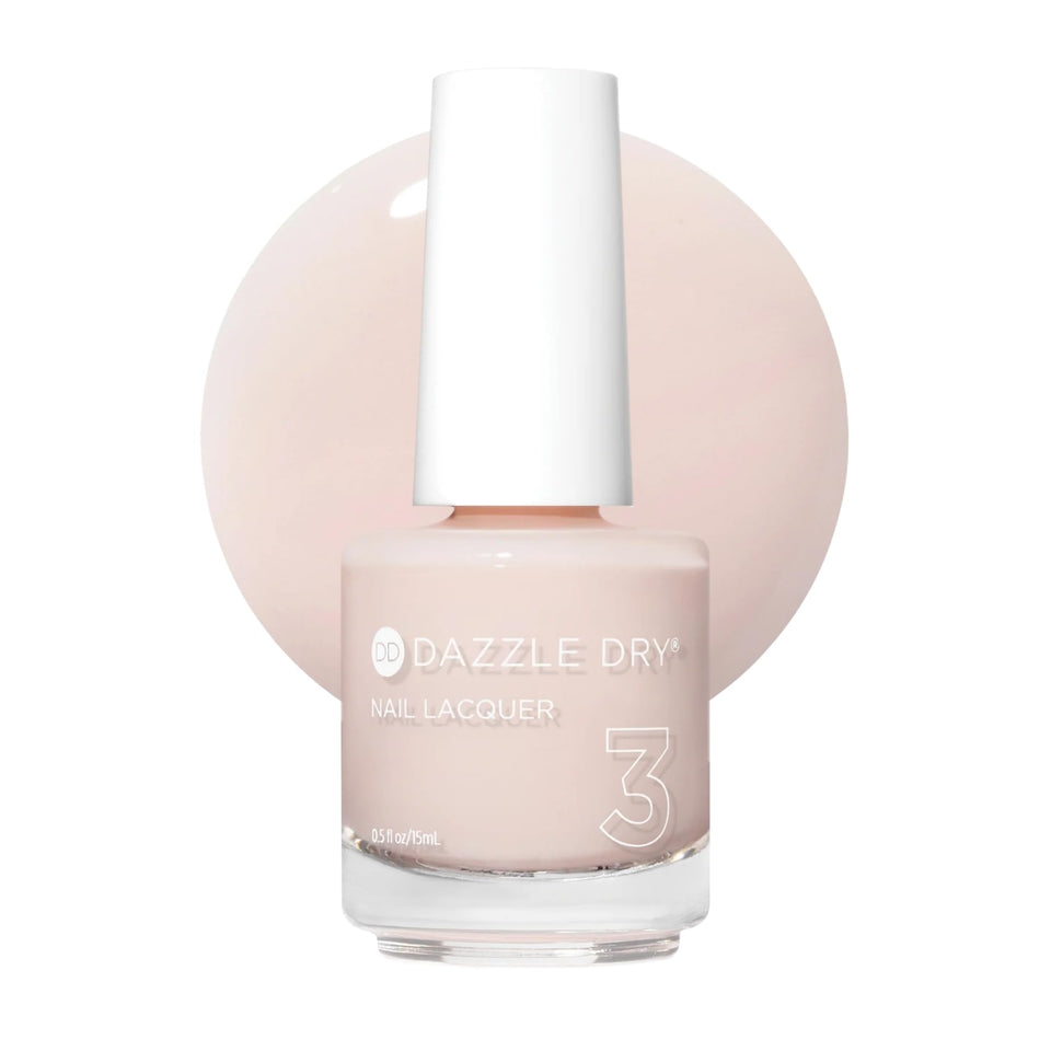 Dazzle Dry Rose Quartz bottle showing a light peach blossom shade for at-home nails.