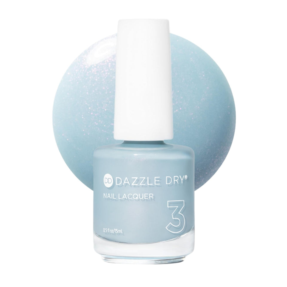 Dazzle Dry Ski Lift nail lacquer bottle close-up with powder blue shimmer for a long-lasting manicure