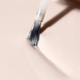 Dazzle Dry So On Pointe application closeup captures quick-dry performance.