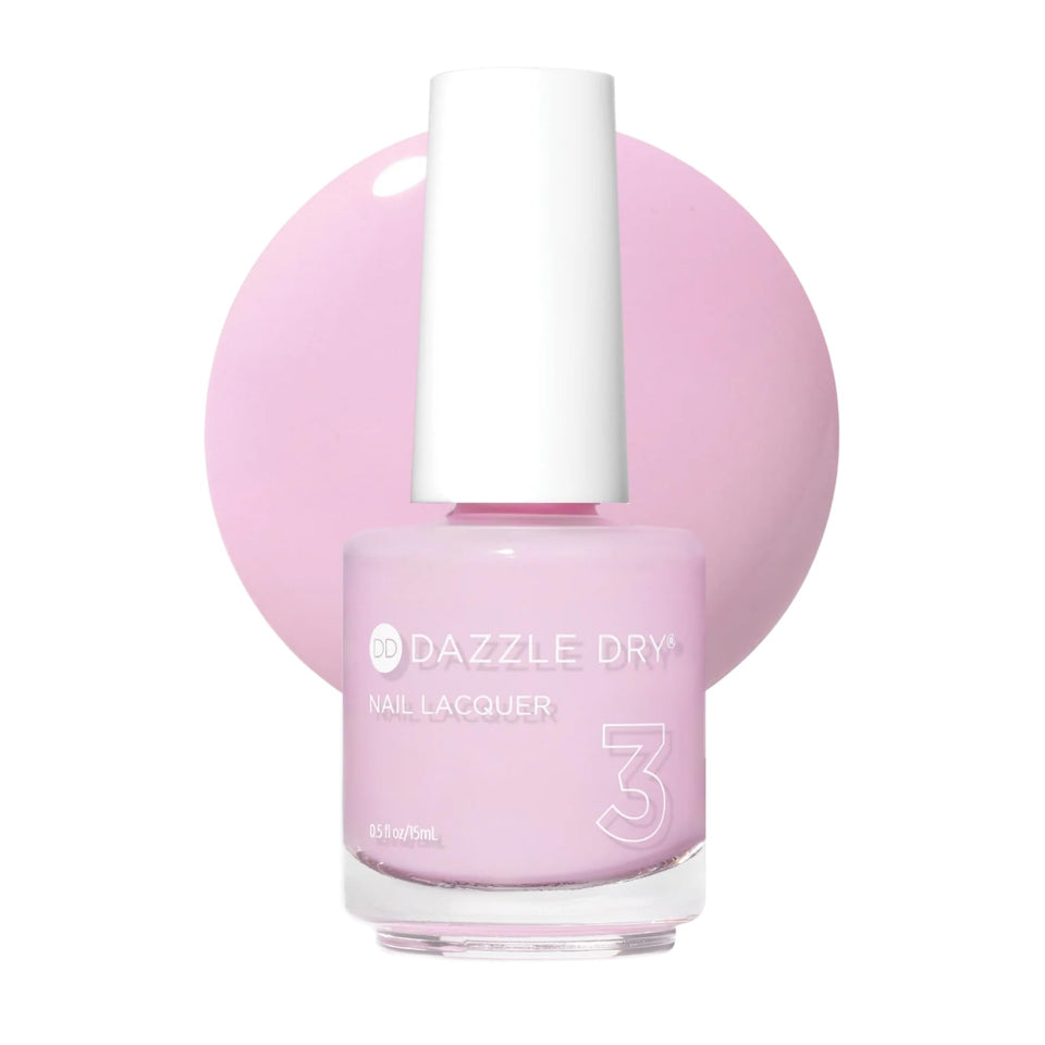 Dazzle Dry Soft Caress bottle shows cool peony pink color for home manicures.