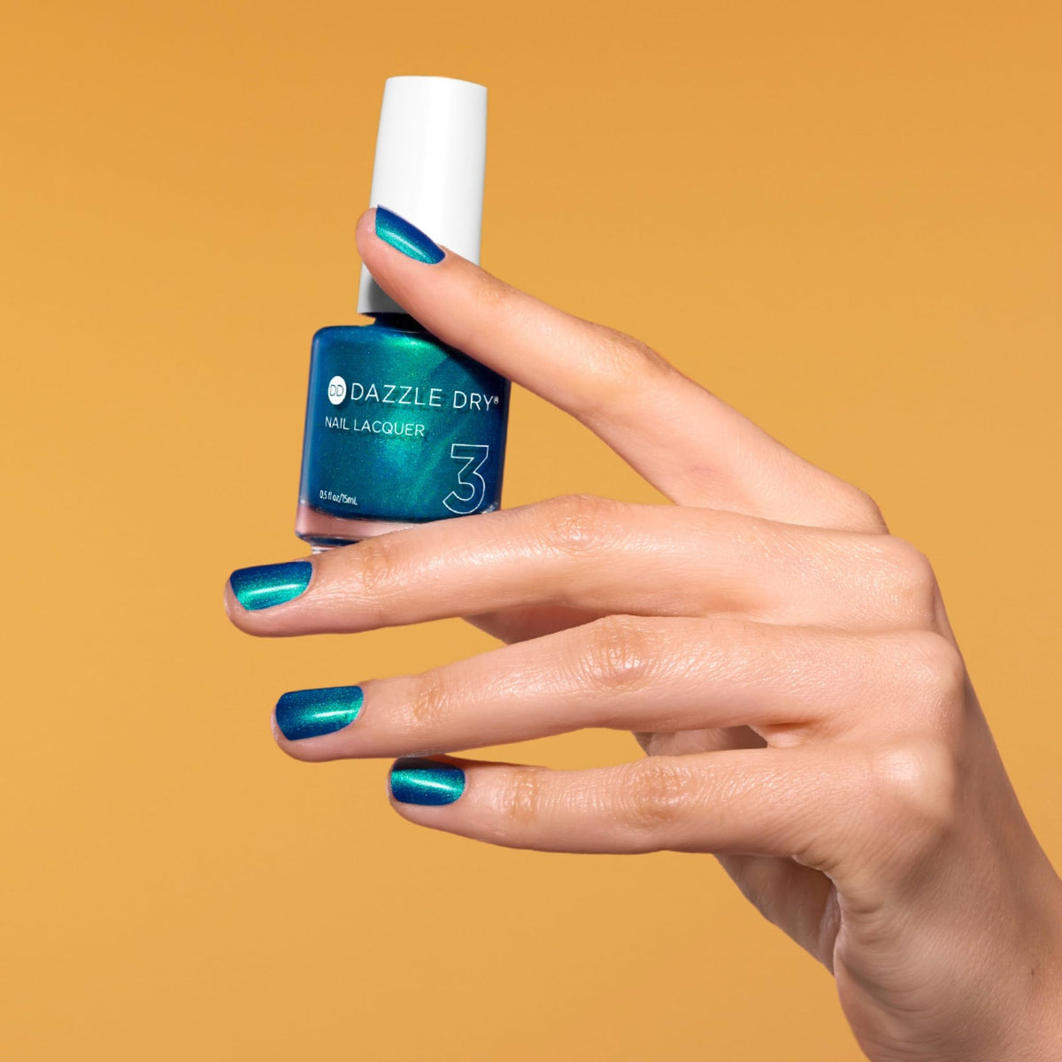 Dazzle Dry Step 3 lacquer aquamarine metallic for flawless at-home manicures.