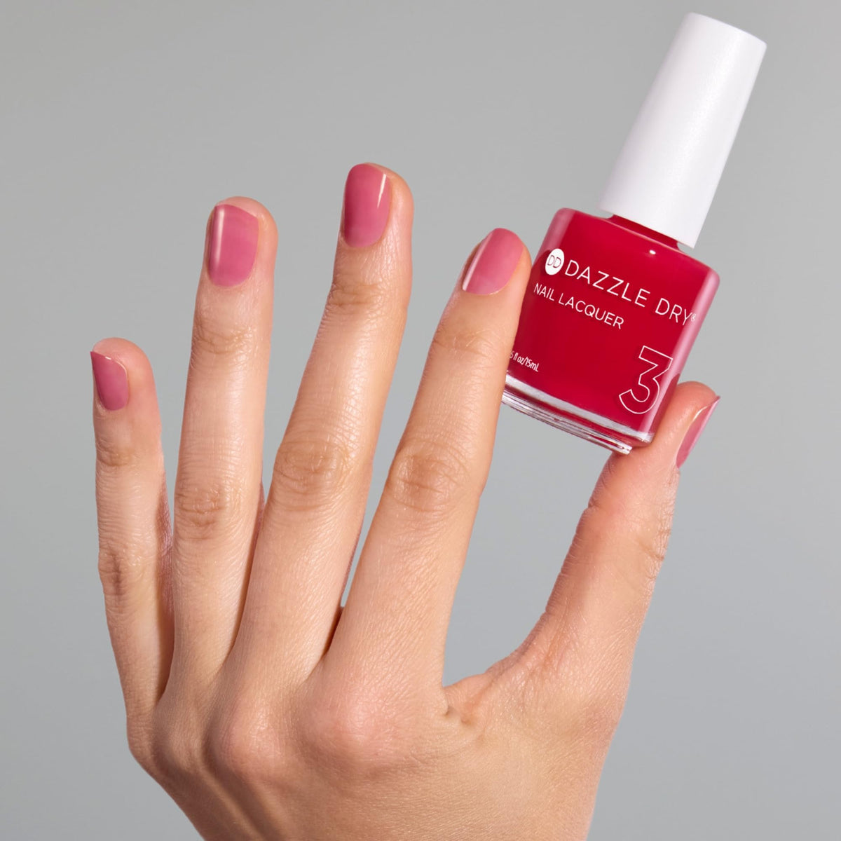 Dazzle Dry Sugar Dipped jelly finish on nails for sheer coverage.