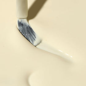 Dazzle Dry Sundress brush stroke showing smooth cream application on the nail.