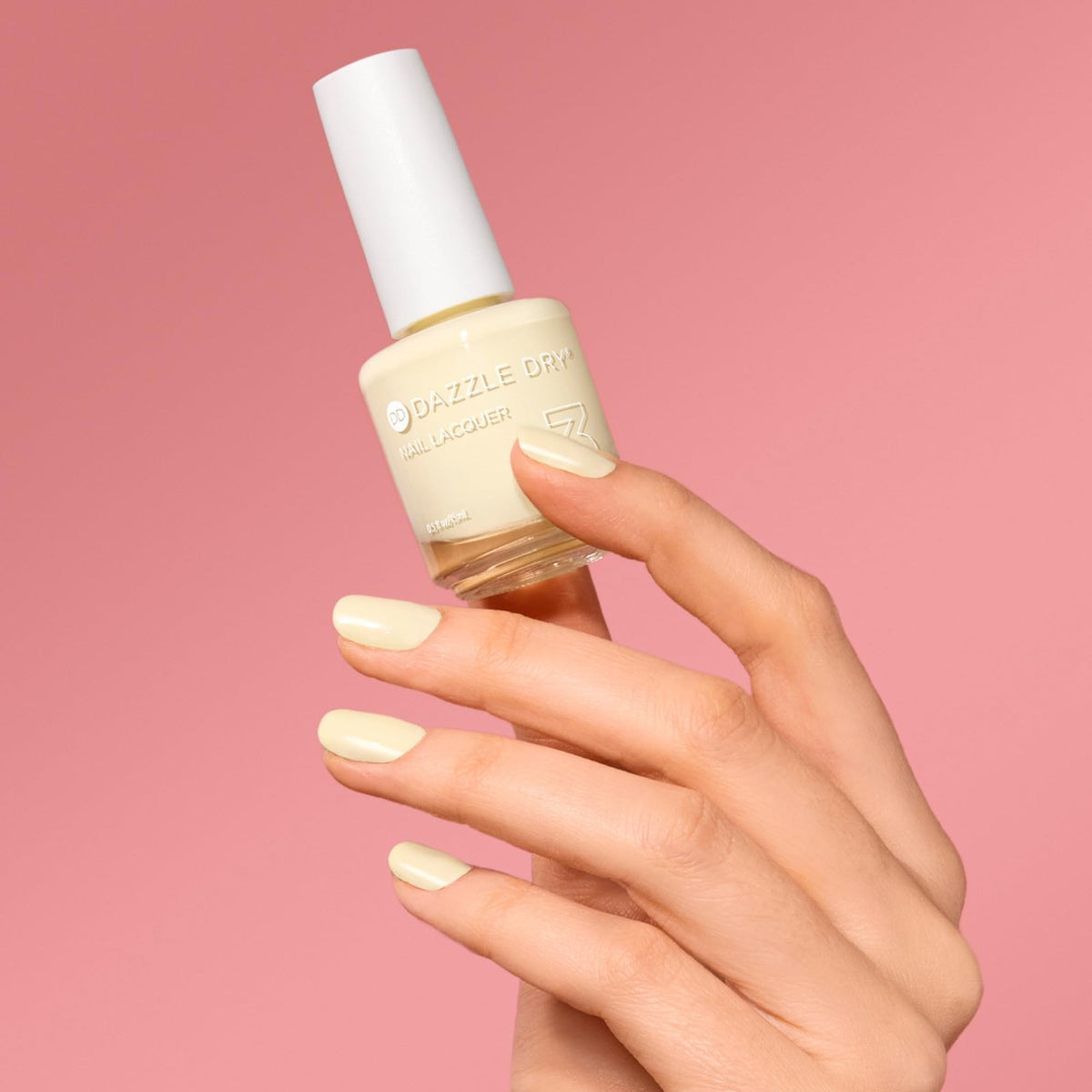Dazzle Dry Sundress on-nail swatch displays full-coverage pastel yellow shade.