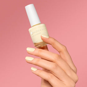 Dazzle Dry Sundress on-nail swatch displays full-coverage pastel yellow shade.