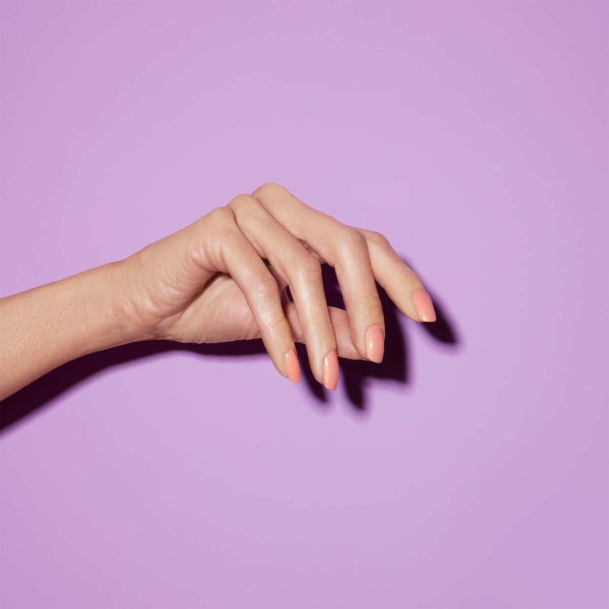 Dazzle Dry Sunset Glow full-nail application; five-minute dry time.