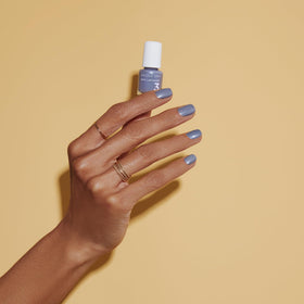 Dazzle Dry top coat bottle provides chip resistant glossy shine