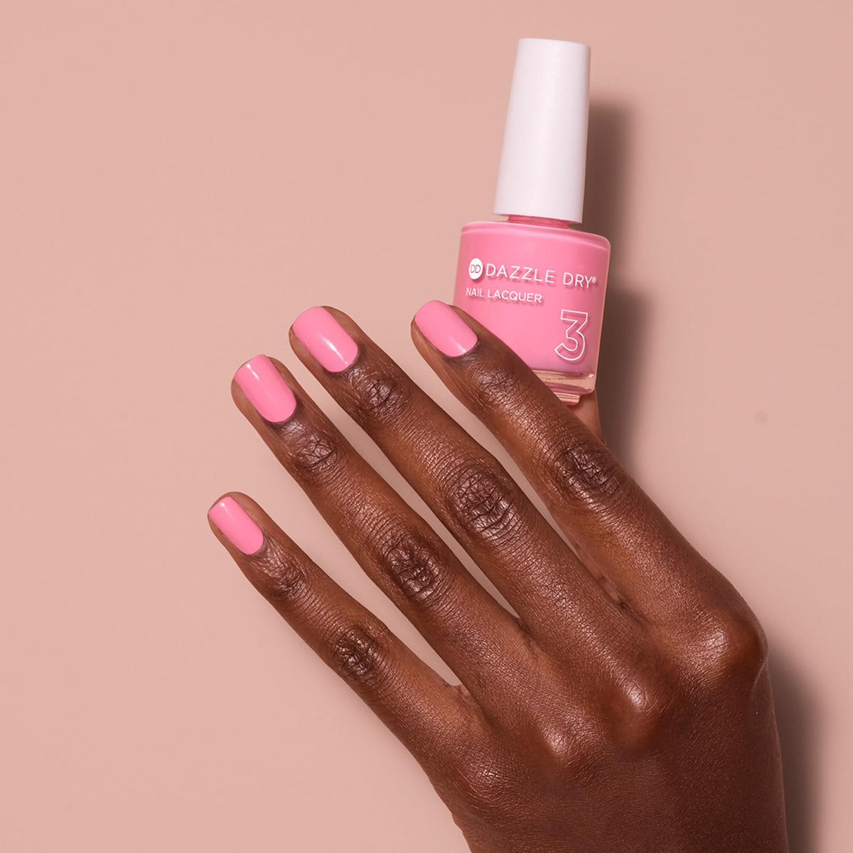Dazzle Dry Soulmate fast-dry bubblegum pink on nails demonstration.