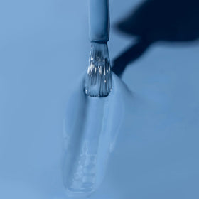 Dazzle Dry Varsity Blues application on nails for salon quality at home
