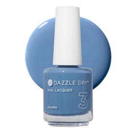 Dazzle Dry Varsity Blues bottle with muted denim shade for quick-dry nails