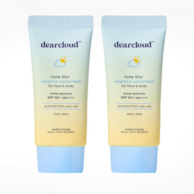 Dearcloud Tone Blur Essence Sunscreen bottle with color-adapting SPF 50 for natural protection.