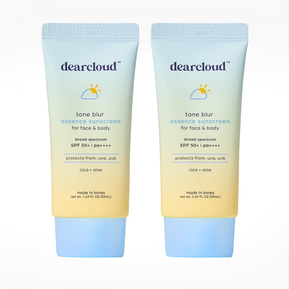 Dearcloud Tone Blur Essence Sunscreen bottle with color-adapting SPF 50 for natural protection.