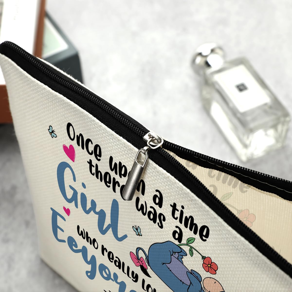 Decohim cartoon donkey makeup bag zipper detail for easy access.