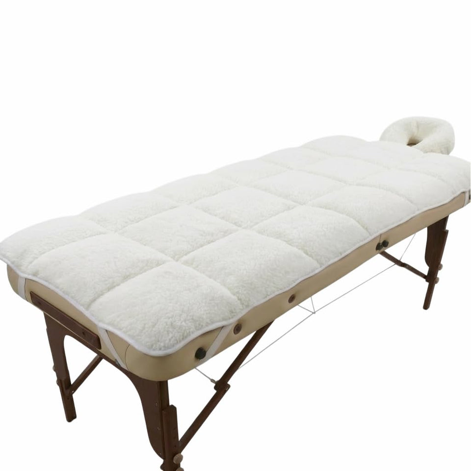 DECORFUNFUN fleece massage table pad provides plush comfort for extended sessions.