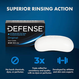 Athlete holds Defense Soap bar ready for post-workout cleansing.