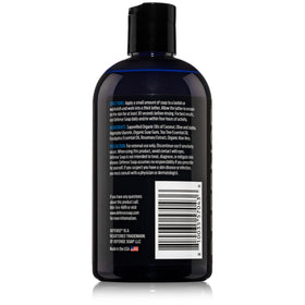 Defense Soap Tea Tree Body Wash Creamy foam texture in a shower scene.