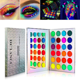 DE'LANCI Aurora Glow palette under UV light offers dramatic, stage-ready color.