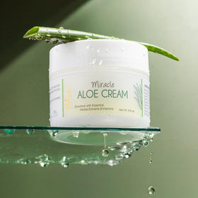 Deluvia Miracle Aloe Cream applied on the face for soothing moisture.