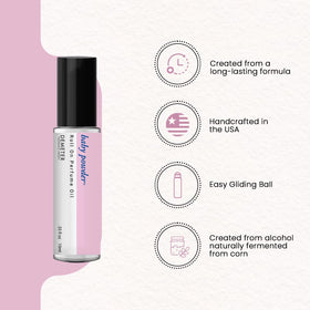 DEMETER Baby Powder Roll-On applied to wrists for subtle, long-lasting aroma.