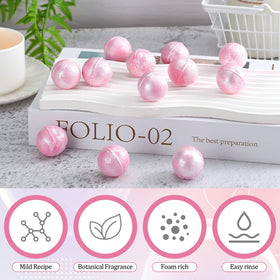 Demissle rose-scent pink bath bombs delivering soothing fragrance.