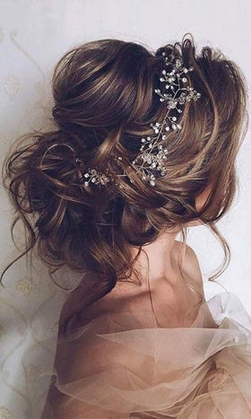 Denifery makeup hair vine crystal-details highlighting vintage deco sparkle.