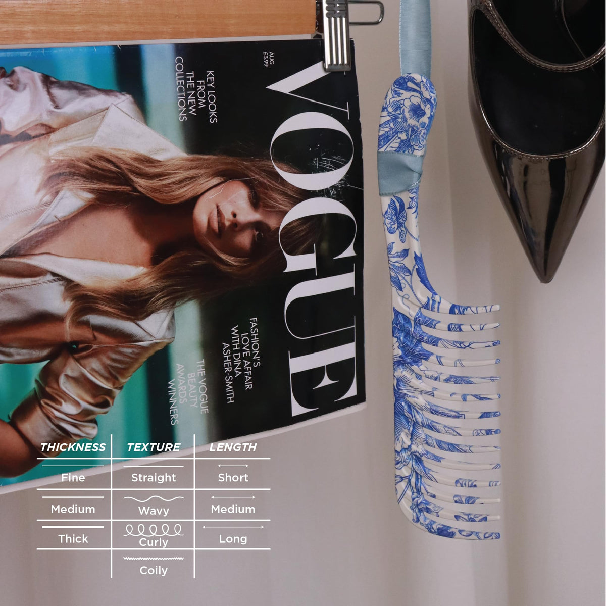 Blue Belle Denman D28 in use on thick hair to prevent breakage.