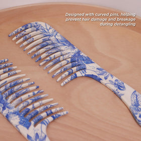 Denman D28 detangler gliding through thick curls with minimal snag.