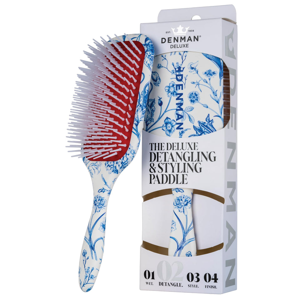 Denman D38 detangling paddle in Blue Belle for smooth detangling through wet or dry hair.