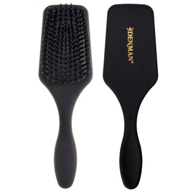 Denman D84 mini paddle brush close-up shows flexible bristles for gentle detangling.