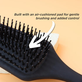 Denman D84 travel-friendly brush designed for everyday grooming routines.
