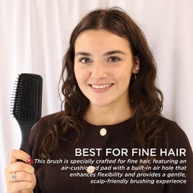 Denman D84 detangling wet or dry hair with gentle bristles.