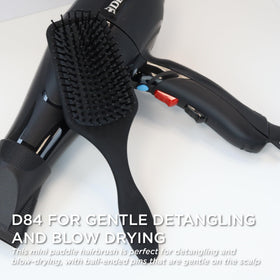 Ergonomic non-slip grip on Denman D84 for comfortable, controlled styling.