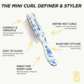 Denman brush with removable pad for easy cleaning and maintenance.