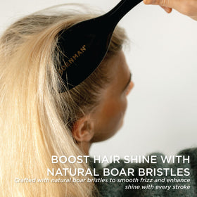 Denman grooming brush medium air cushion pad glides through hair gently for detangling.