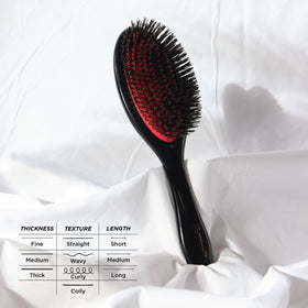 Denman grooming brush medium updo smoothing for a refined finish.