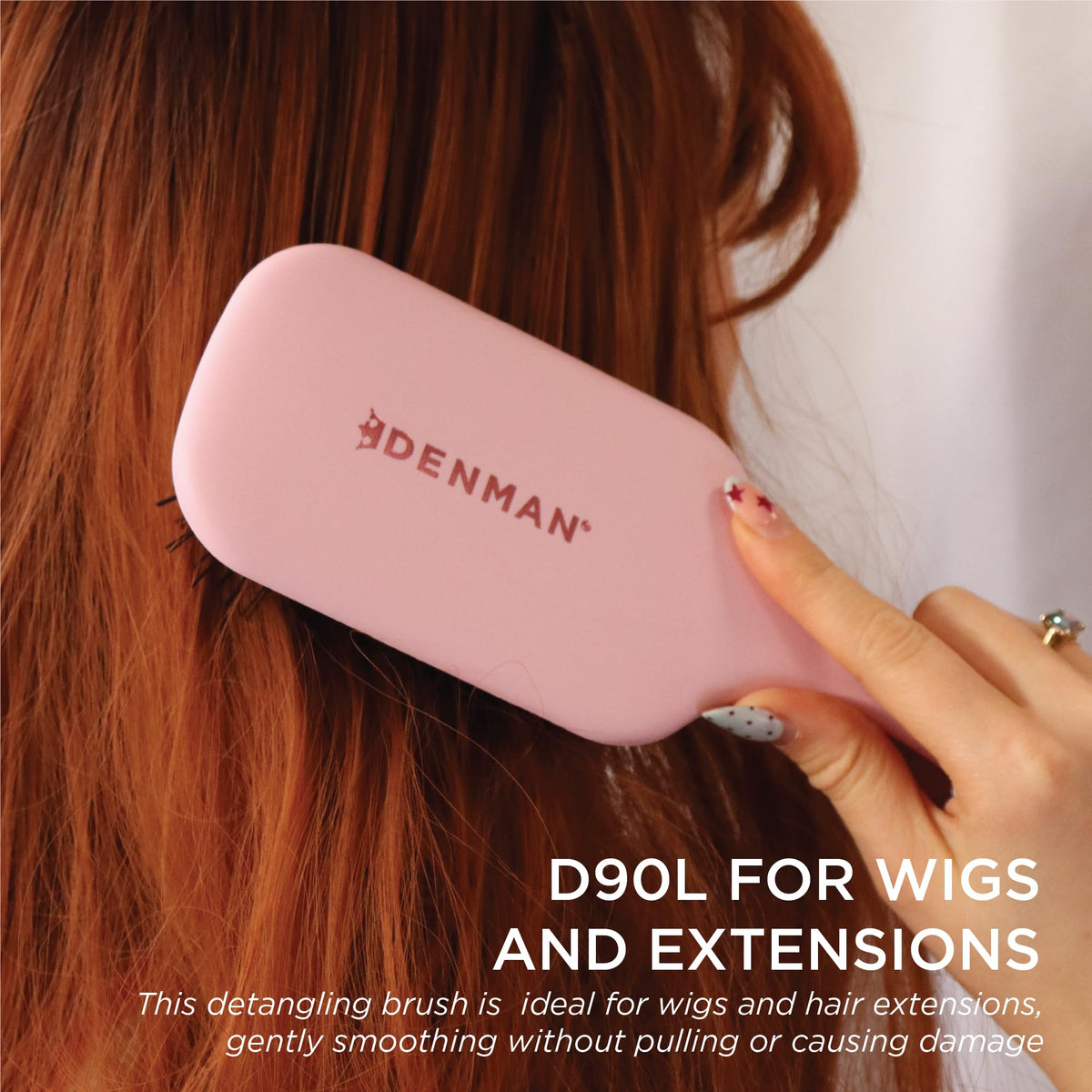 Denman brush with large paddle designed for longer hair lengths