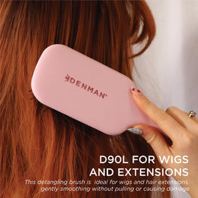 Denman brush with large paddle designed for longer hair lengths