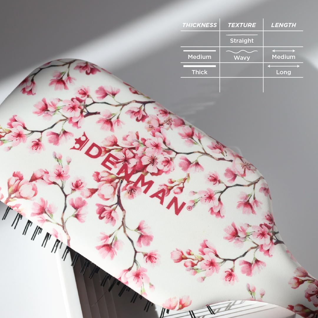 Denman long-hair paddle brush enables efficient knot removal.