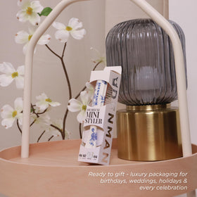 Denman brush enables sleek blow-drying for a polished finish.