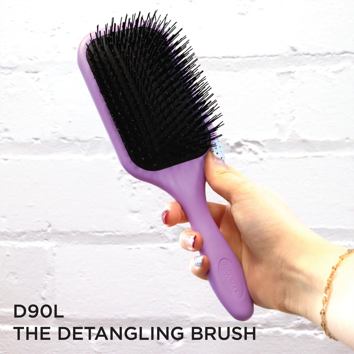 Denman Tangle Tamer Ultra works well with wigs and extensions for seamless detangling