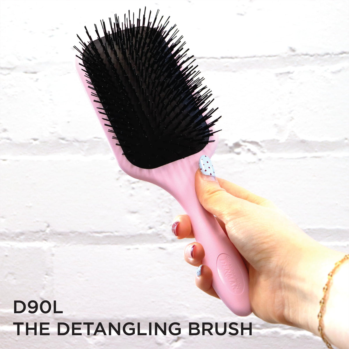 Denman detangling brush offers tug-free comfort during brushing